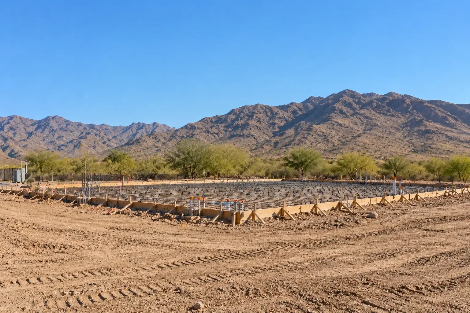 Commercial metal building concept showing foundation preparation